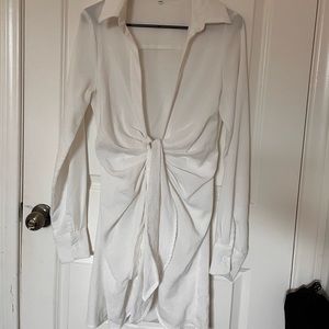 White button up style dress. Size medium.